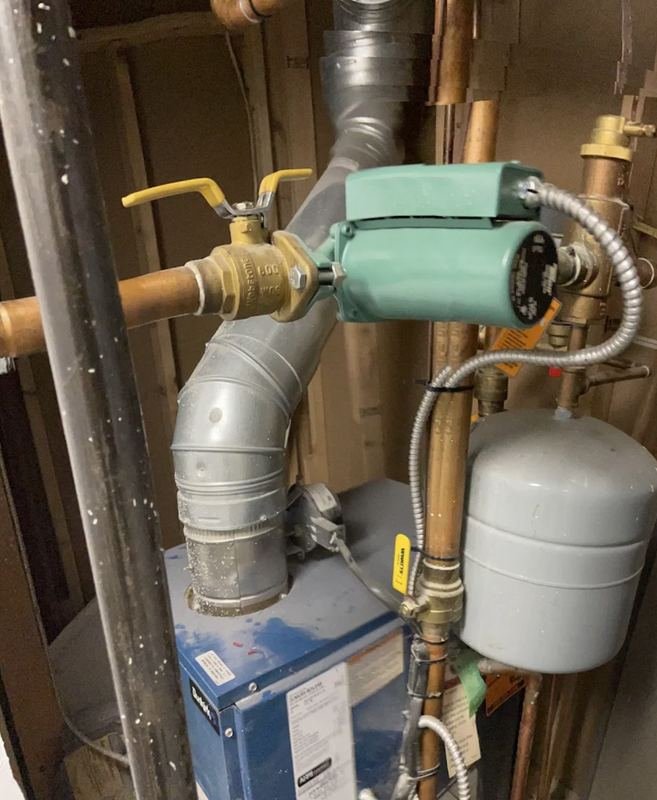 Replacement circulator pump and expansion tank on a residential boiler